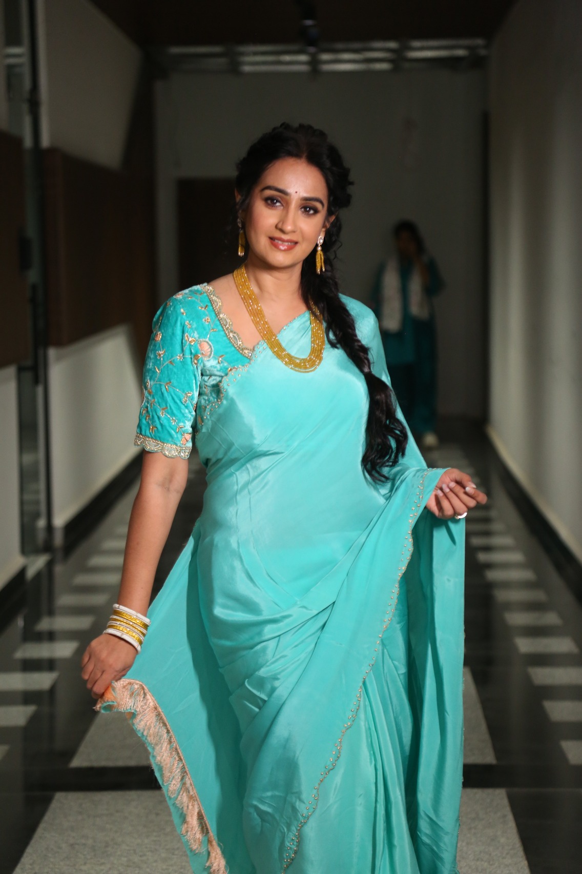 Laya turquoise saree statement fashion pose