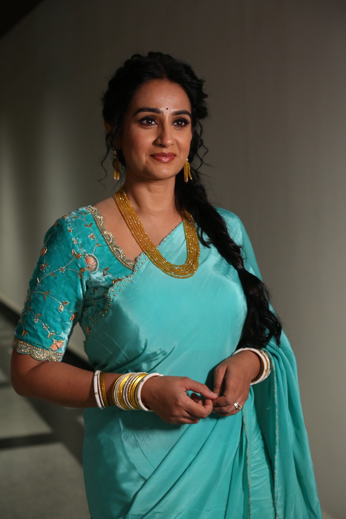Laya turquoise saree vibrant graceful appearance