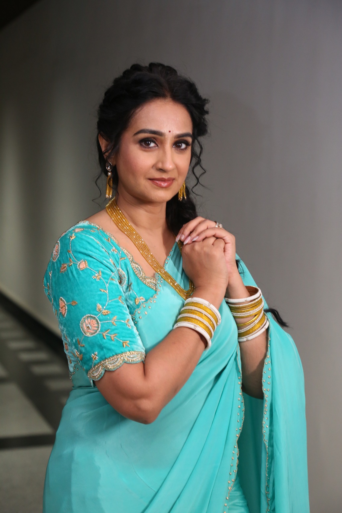Laya turquoise saree gold accessories chic look