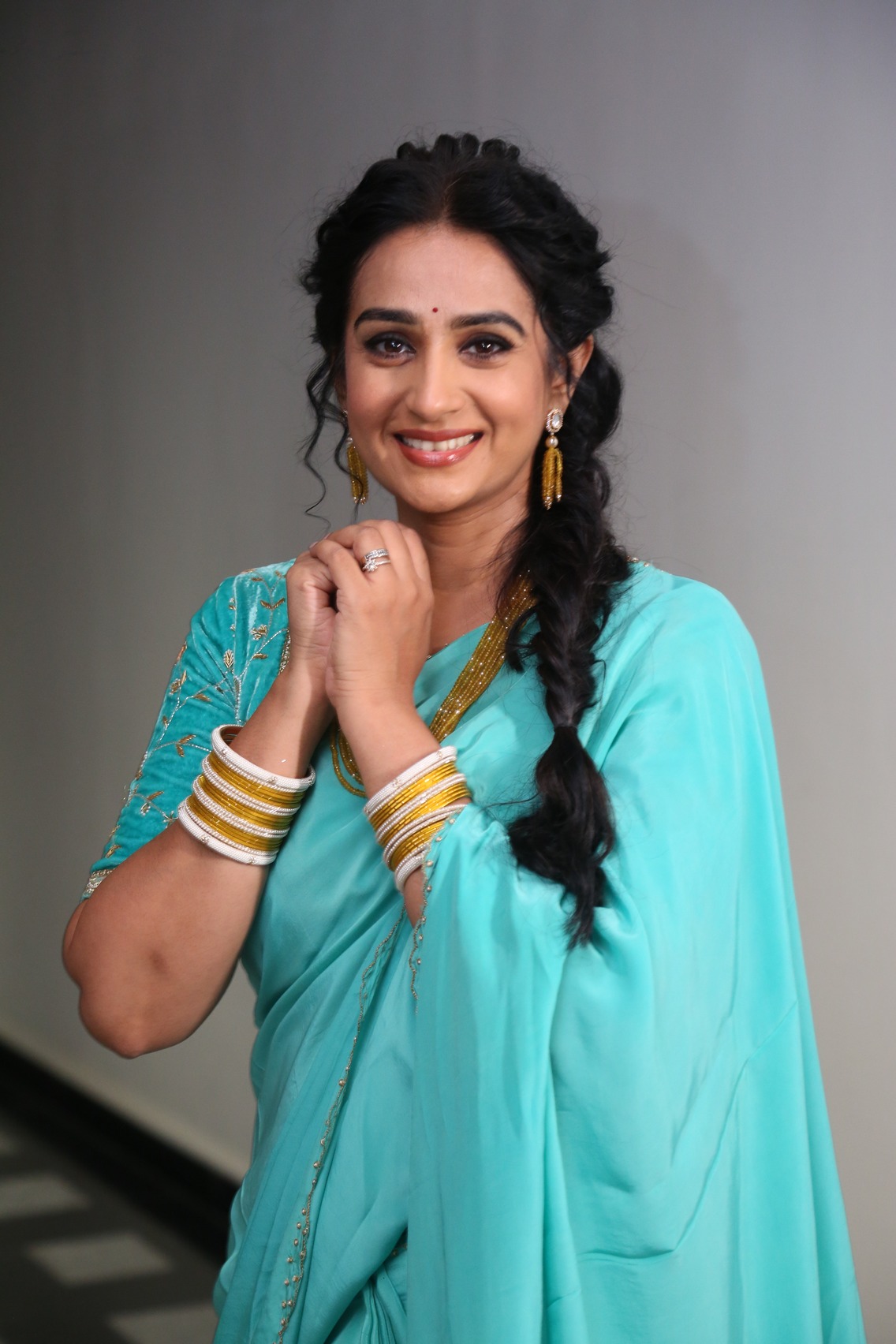 Laya turquoise saree graceful confident pose