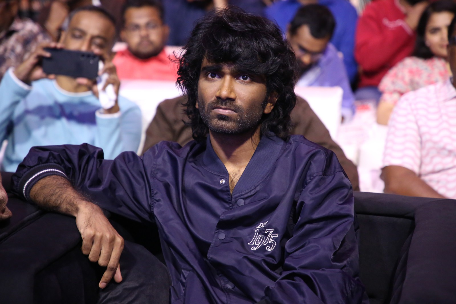 Pradeep Ranganathan seated event