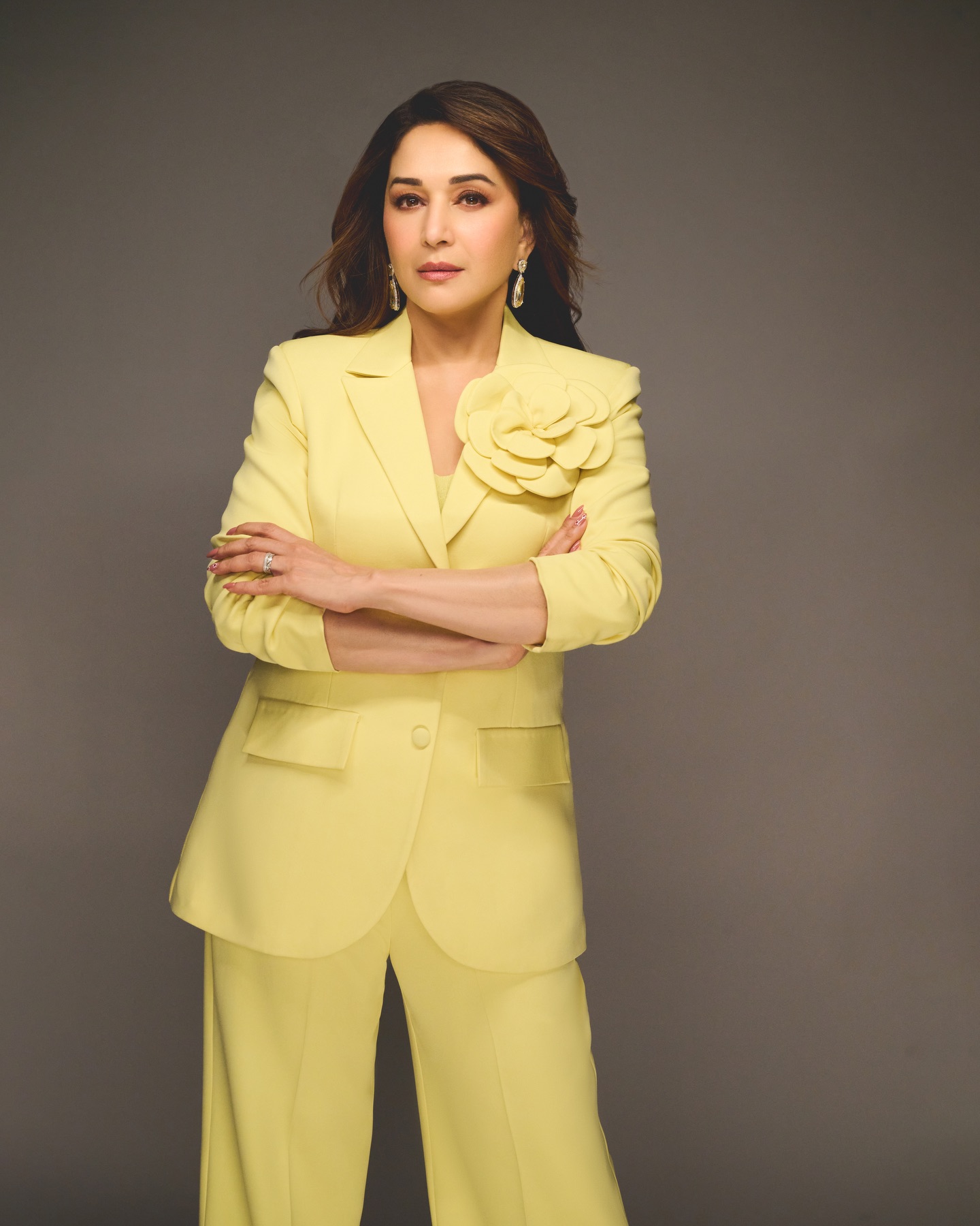Close-up of Madhuri Dixit with dewy makeup and soft waves hairstyle