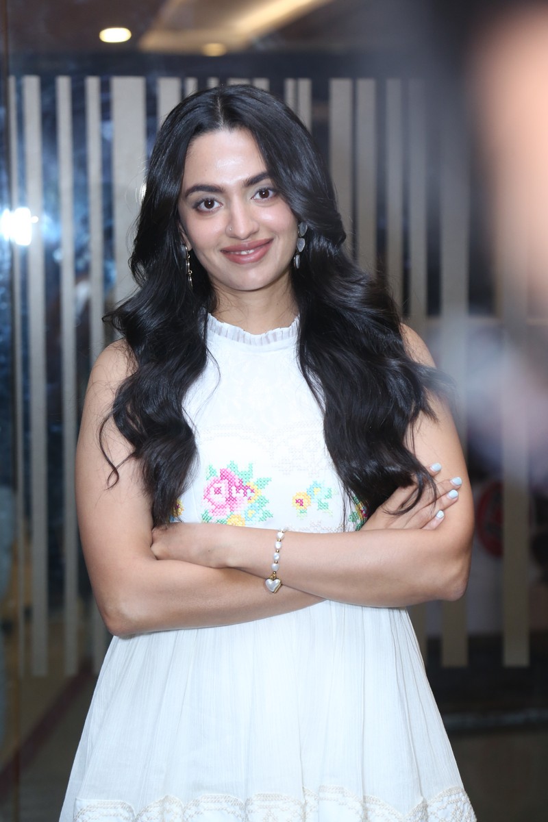 Malvika Nair in vintage-inspired dress with modern and sophisticated styling