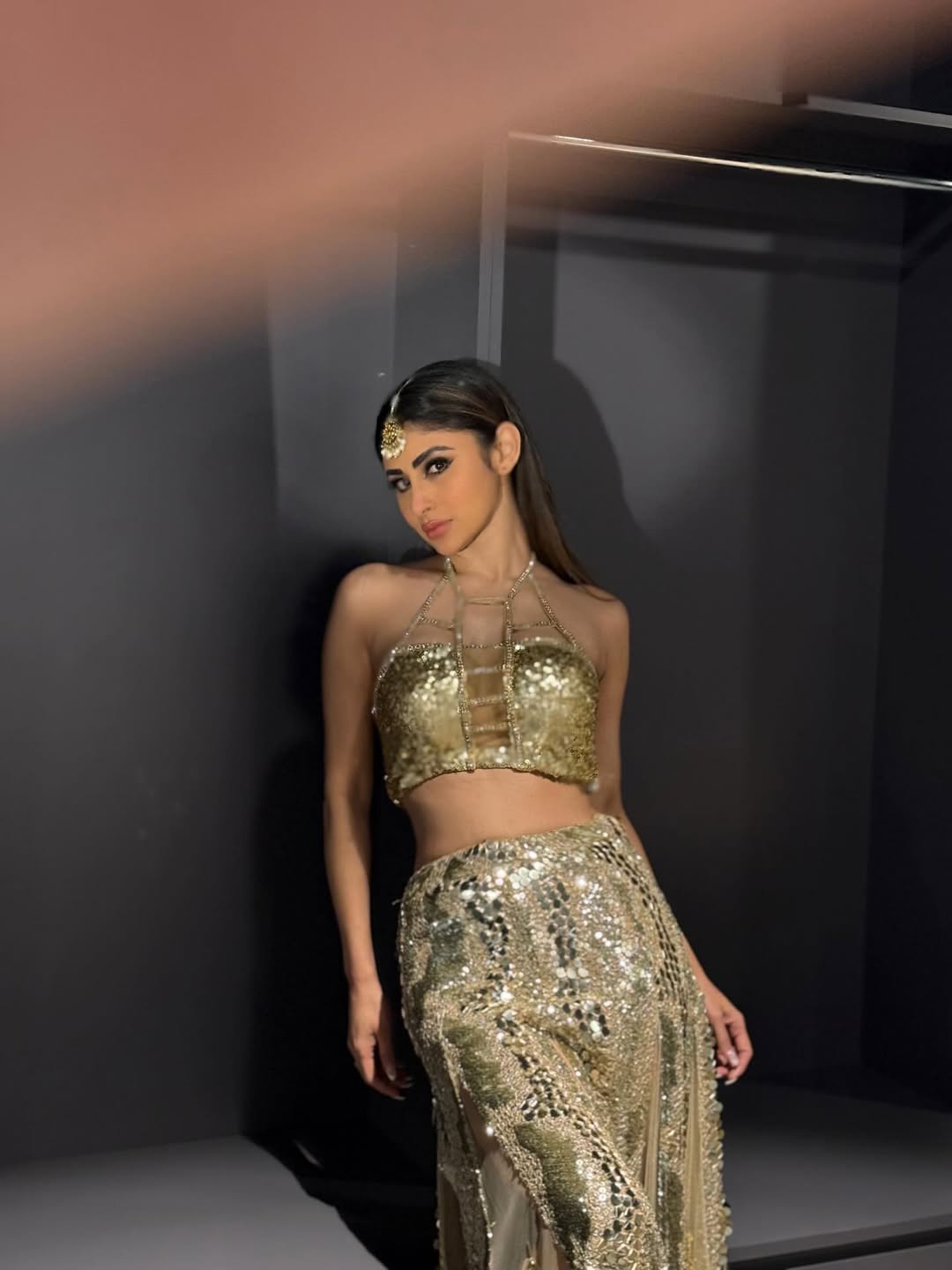 Mouni Roy gold sequin outfit maang tikka glamorous look