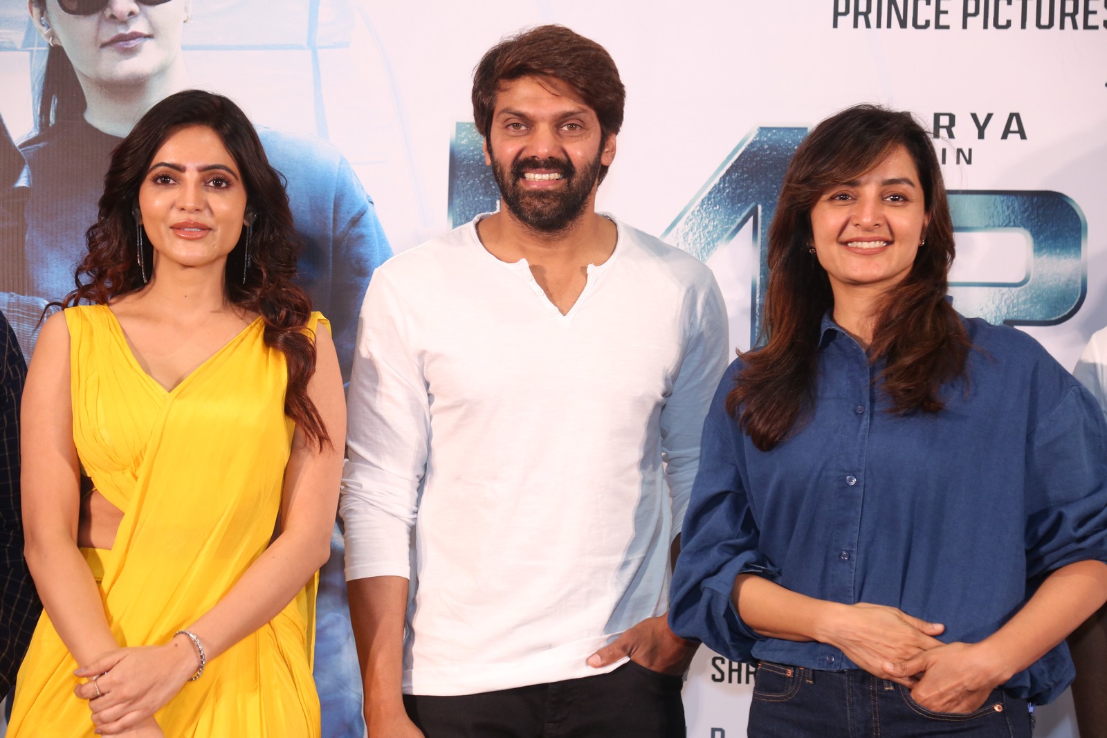 Athulya Ravi Arya Manju Warrier pose for media