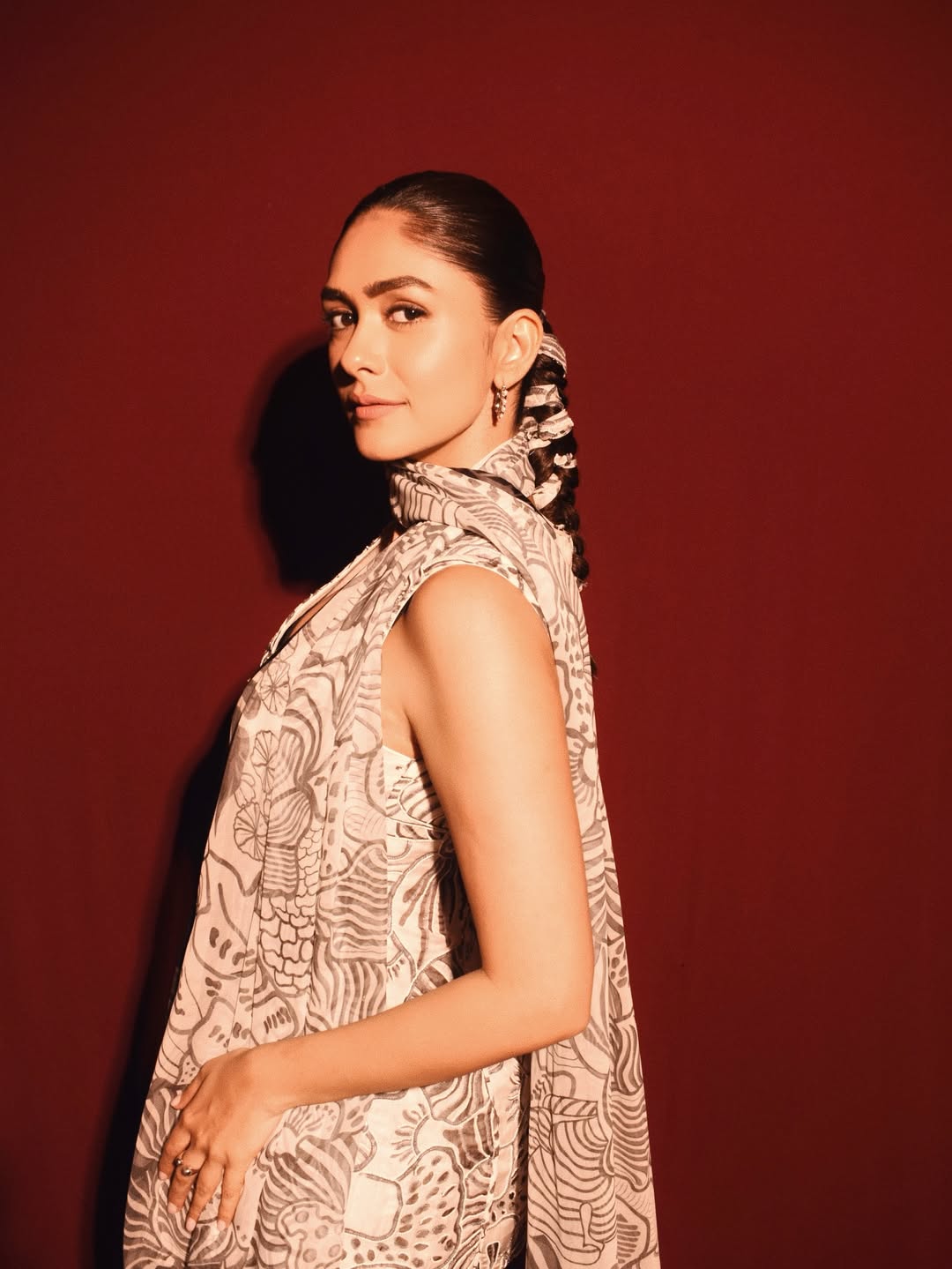 Mrunal Thakur flowing outfit artistic pattern pose