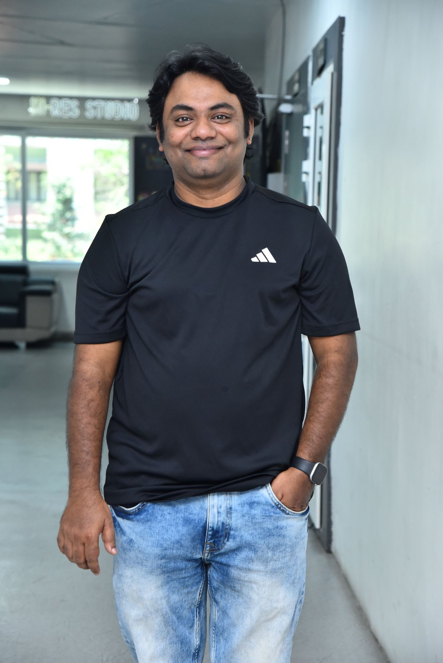 Naga Vamshi casual cool Adidas tee smartwatch look