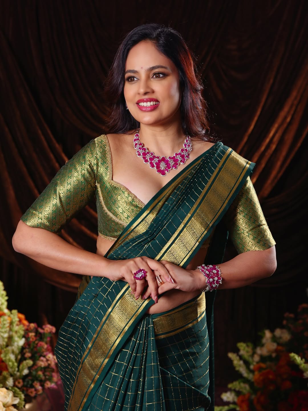 Nandita Swetha gold green saree glamorous look