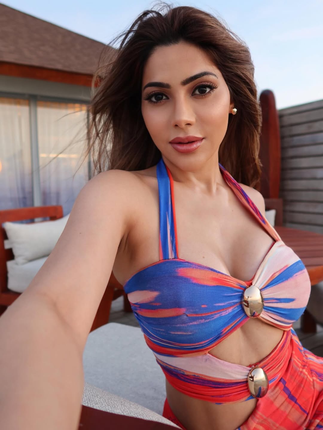 Nikki Tamboli bold swimsuit confident beach style