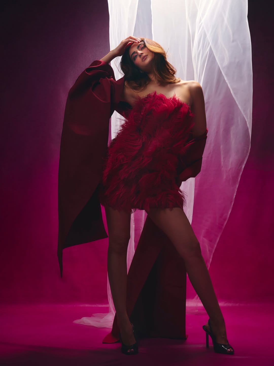 Palak Tiwari confident pose red couture look
