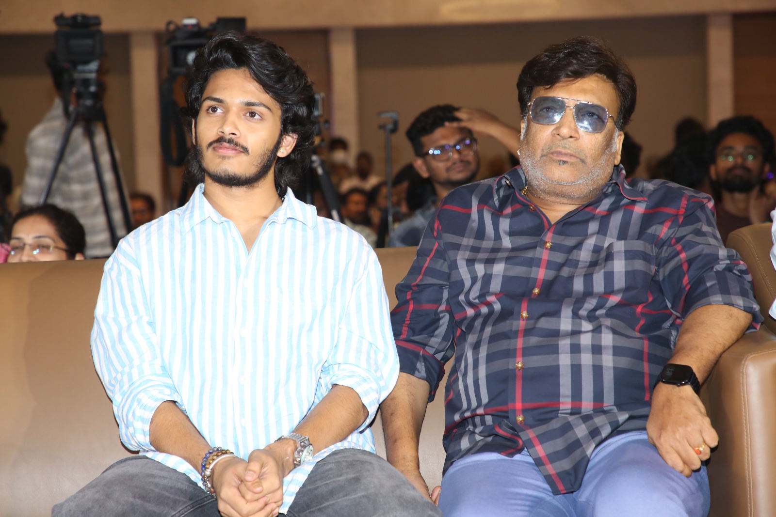 Harsh Roshan Kona Venkat seated at event
