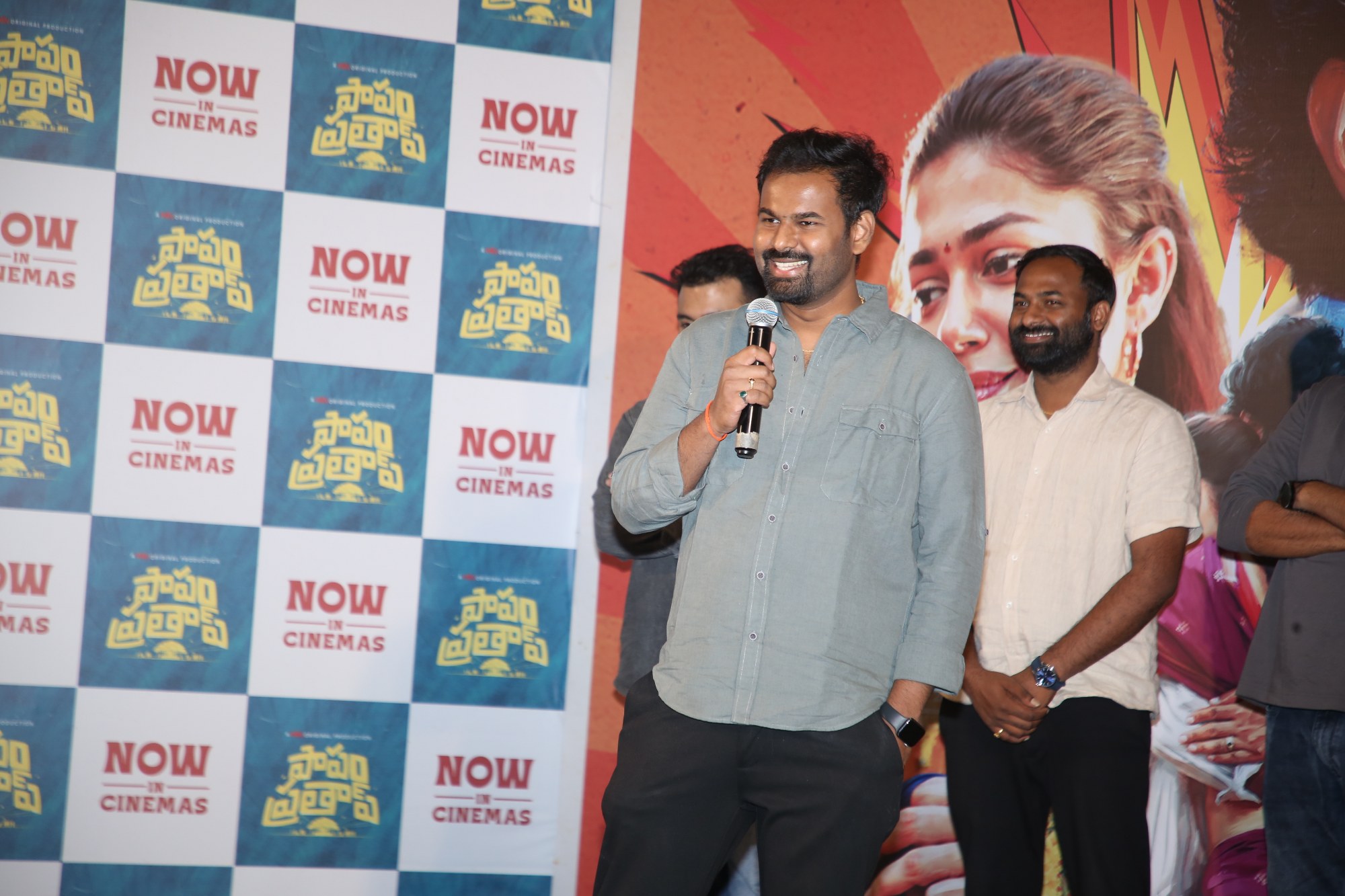 team thanking audience event