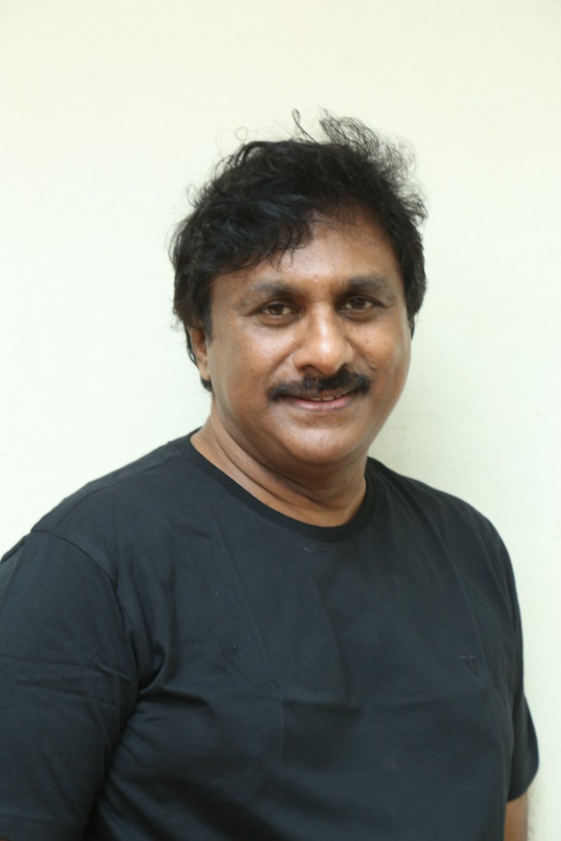 Raghu Kunche casual stylish look lively hairstyle