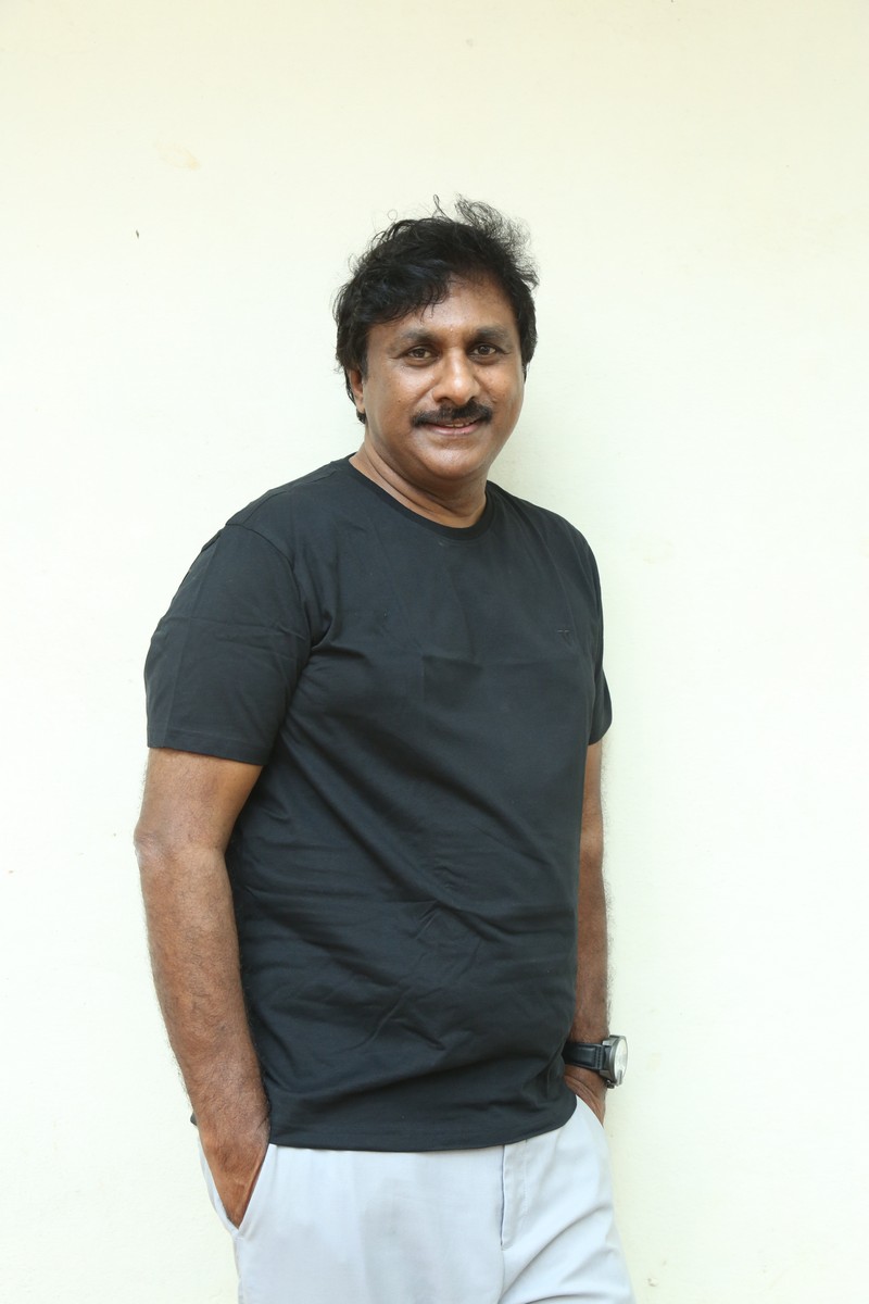 Raghu Kunche black outfit clean stylish appearance