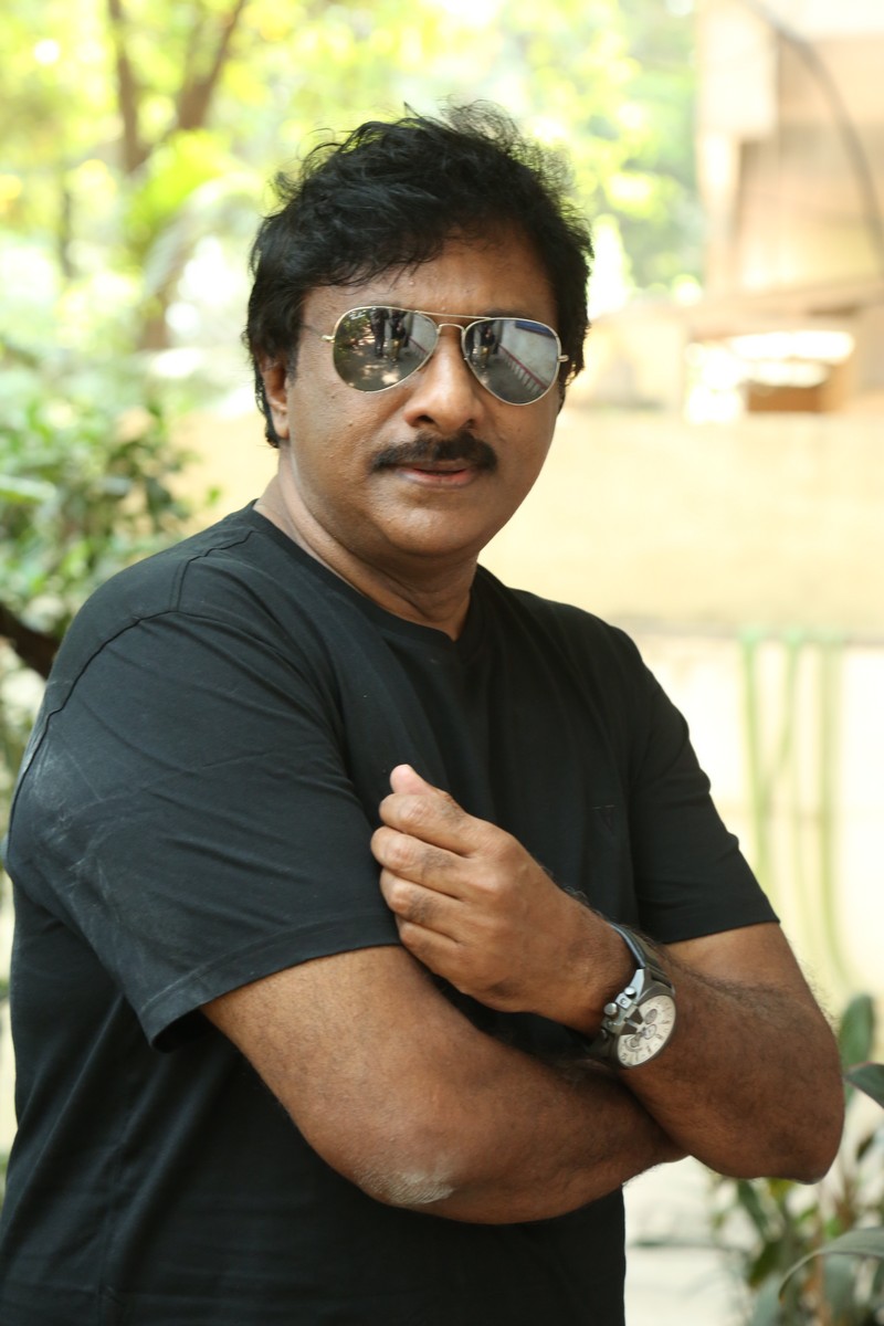 Raghu Kunche black outfit watch stylish appearance