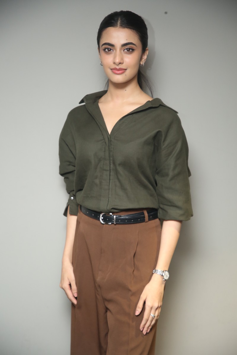 Rhea Singha olive shirt brown trousers smart styling