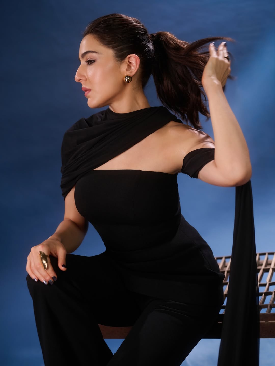 Sara Ali Khan modern look black outfit with stylish accessories and confident posture