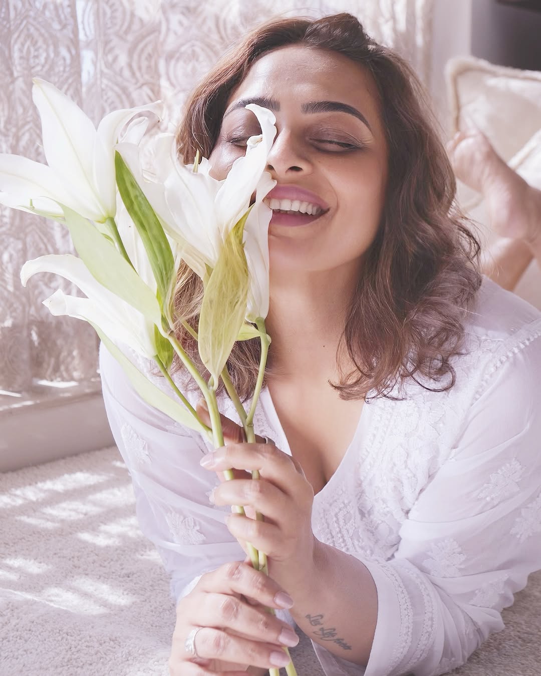 Shilpa Shirodkar white outfit serene pose