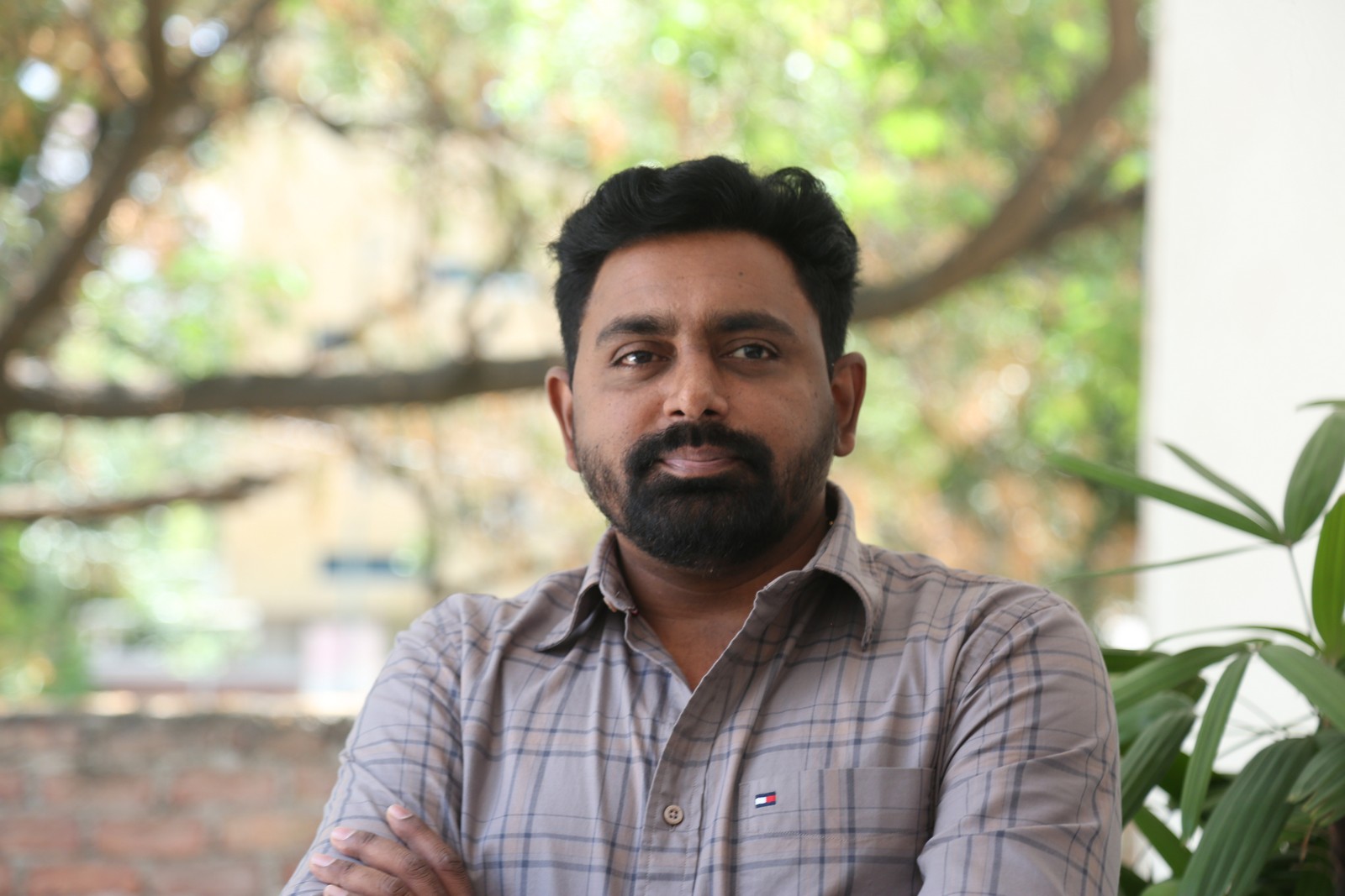 Shiva Prasad confident pose in classic shirt look