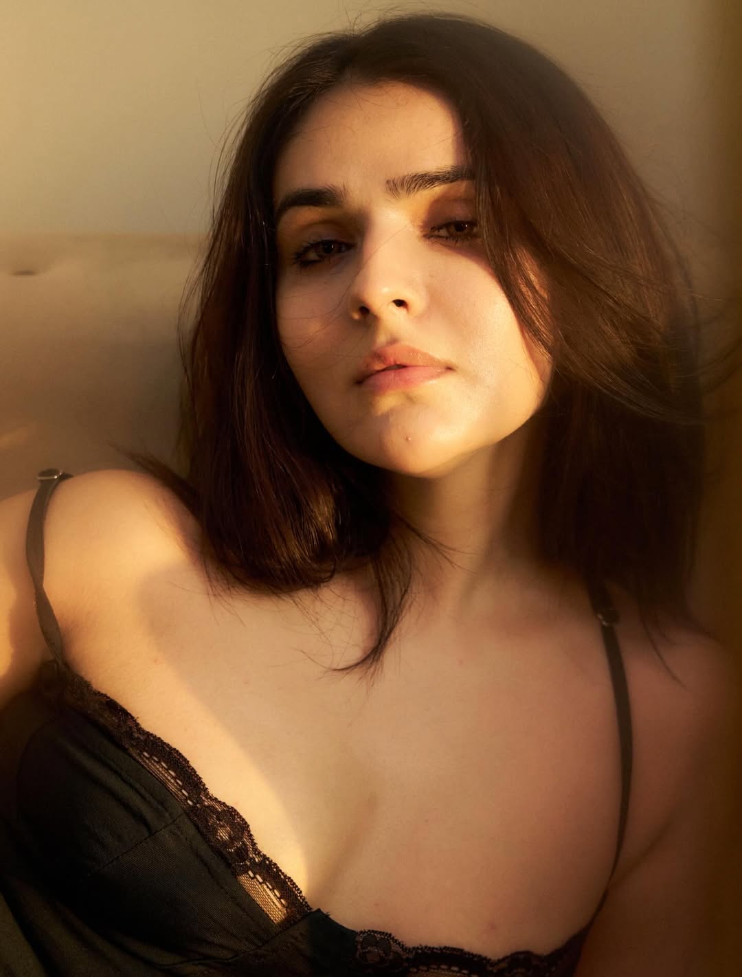Sidhika Sharma in chic black lace outfit showcasing confident and stylish pose