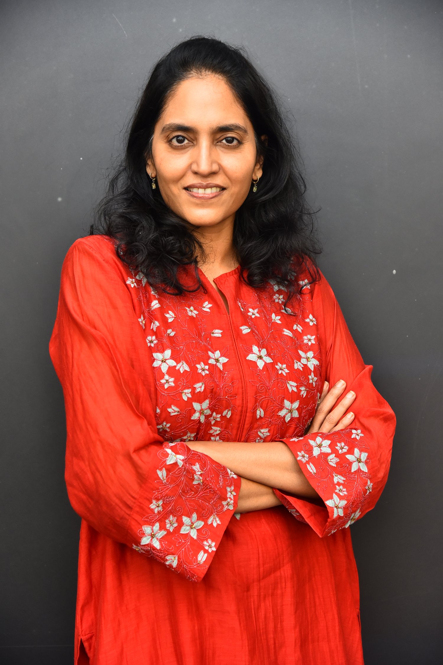 Supriya Yarlagadda bold red attire with elegance