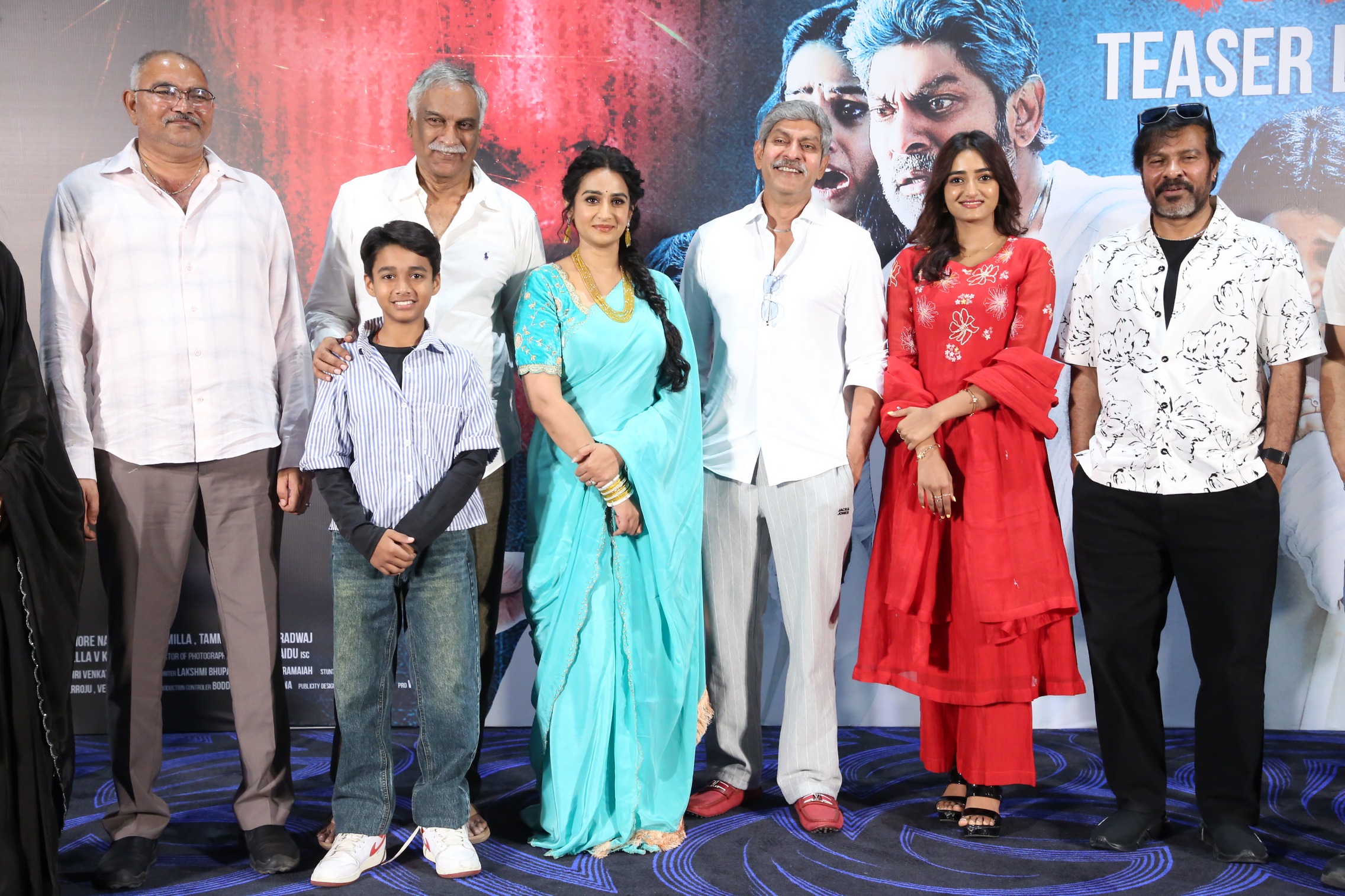 Producers, cast, and DOP Chota K Naidu posing together at Vadhala event