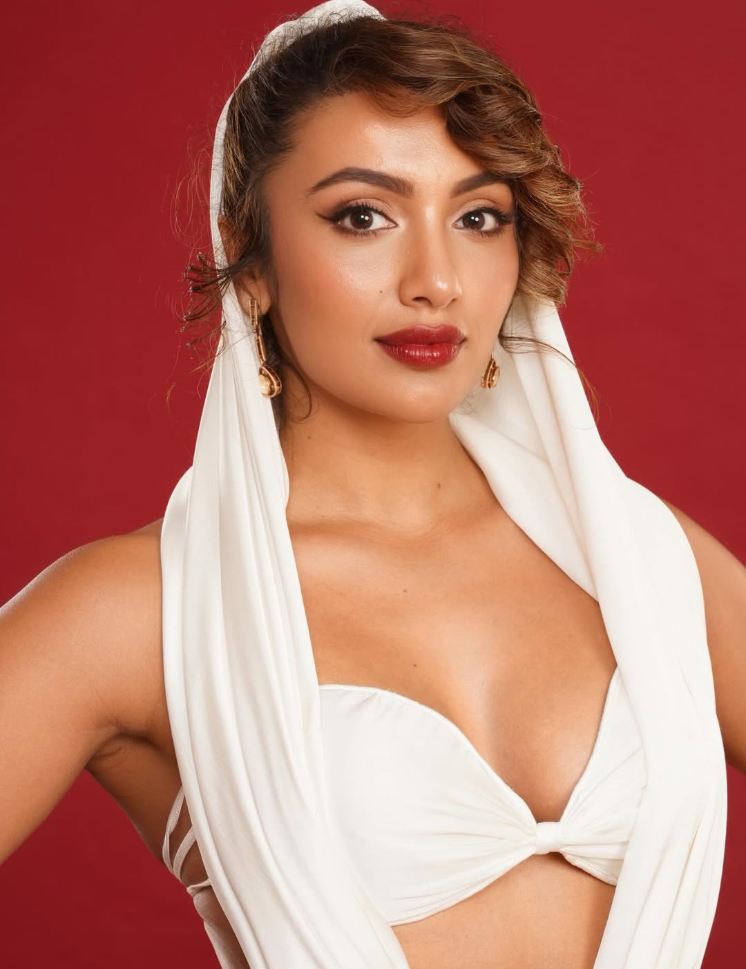 Tejaswi Madivada classy white outfit chic confident pose