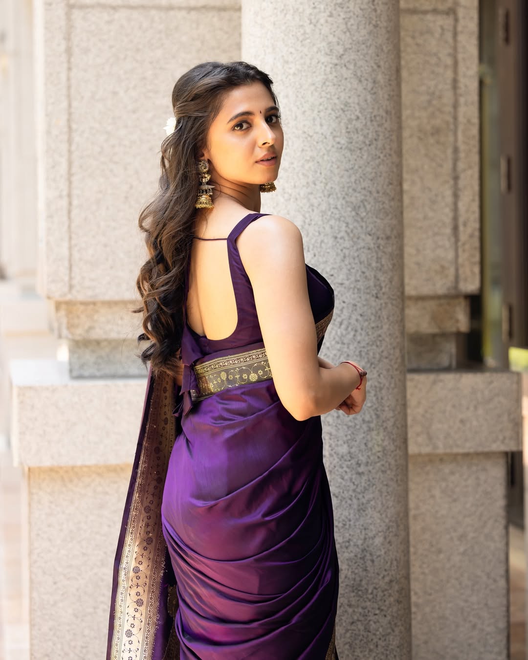 Preethi Asrani dazzling in purple saree and bold look