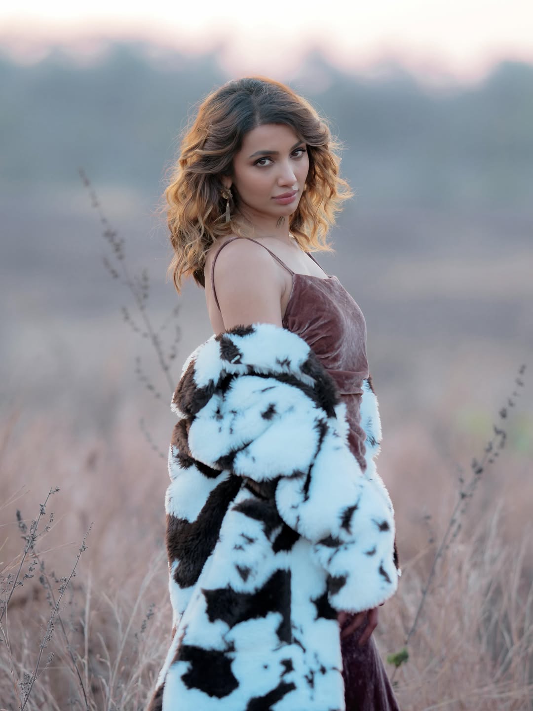 Tejaswi Madivada stylish cow-print coat fashion look
