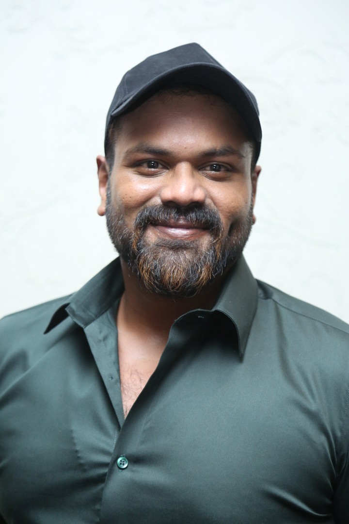 Manchu Manoj wearing sunglasses and stylish attire