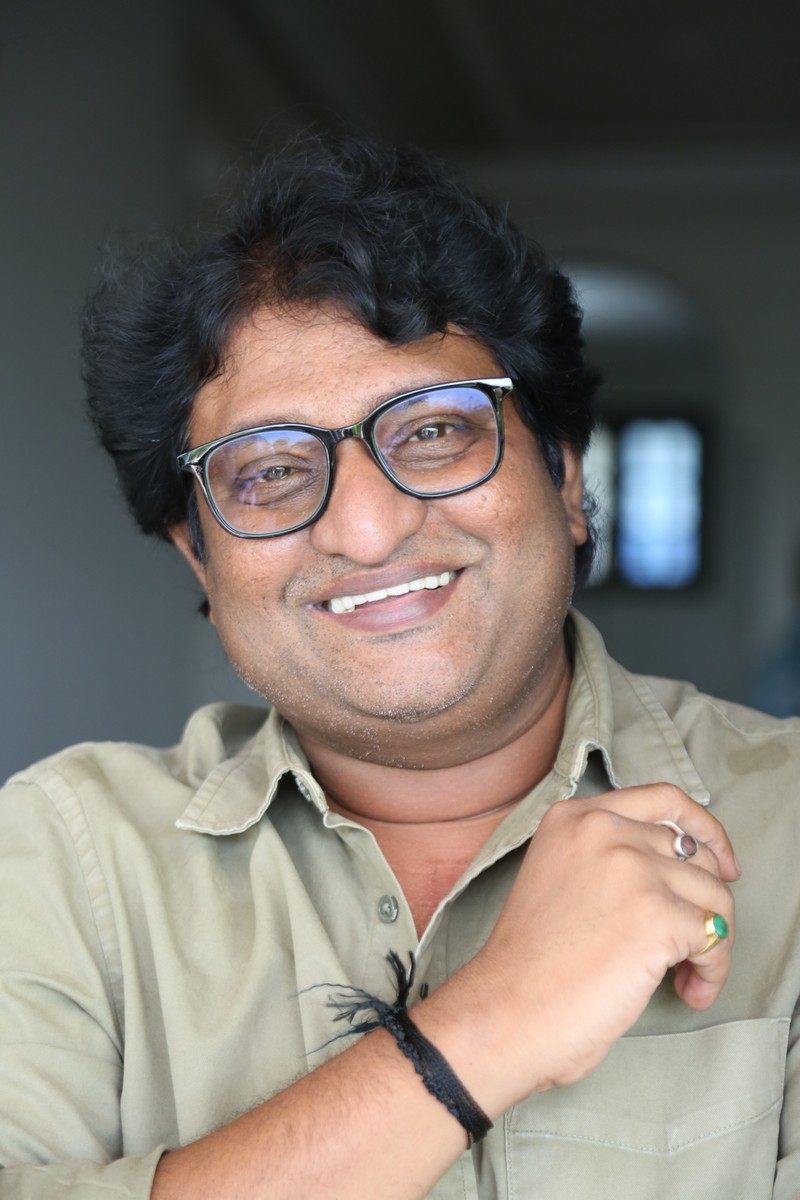 Avinash Kolla showcasing stylish accessories and modern casual look