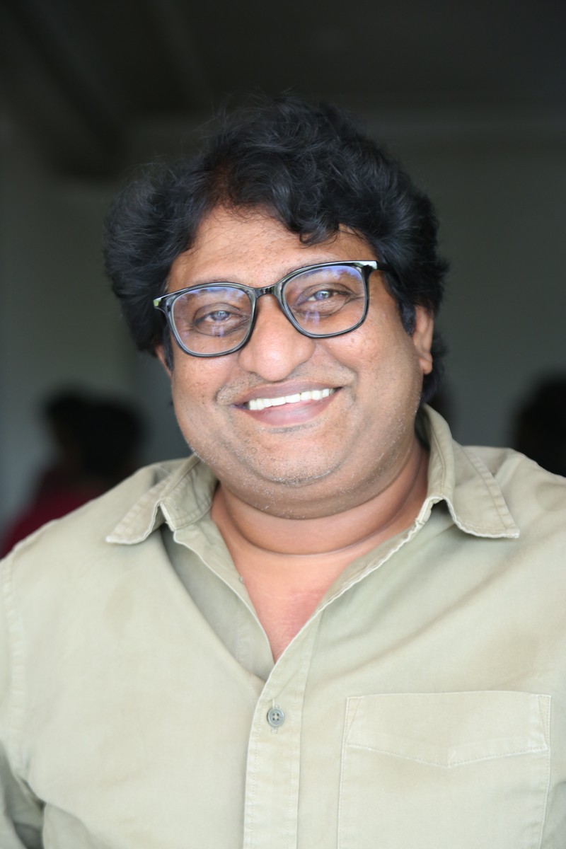 Avinash Kolla in glasses showcasing elegant and confident appearance