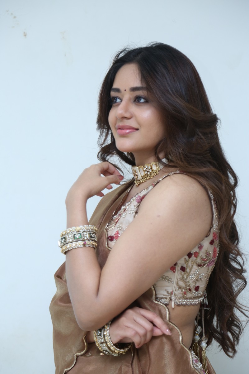 Deepshikha Chandran posing in statement necklace look
