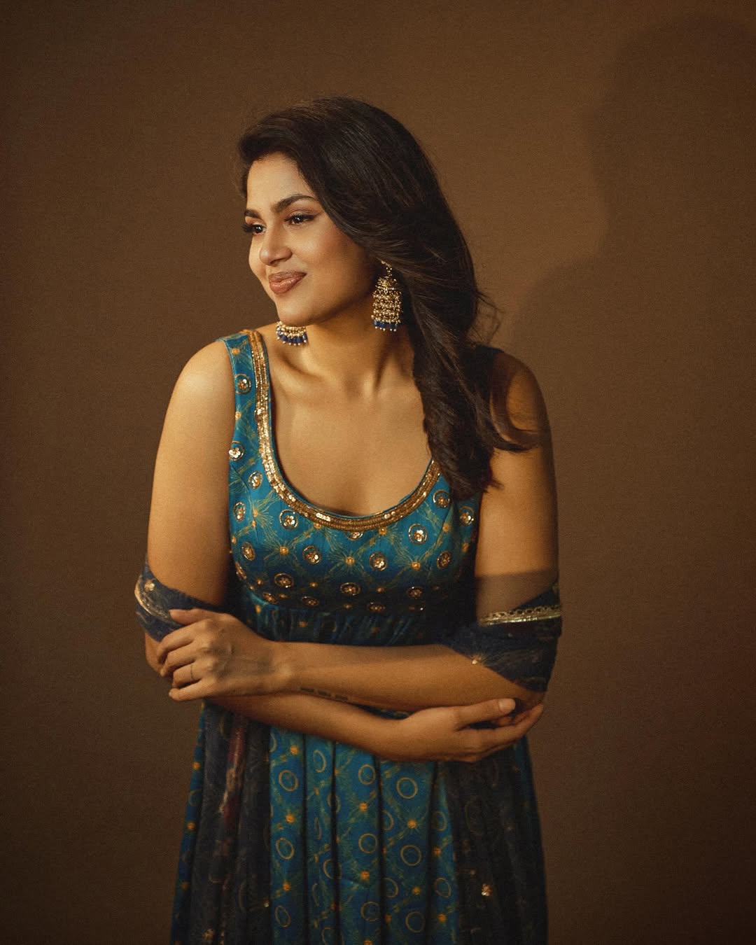Faria Abdullah in teal Anarkali with gold motifs