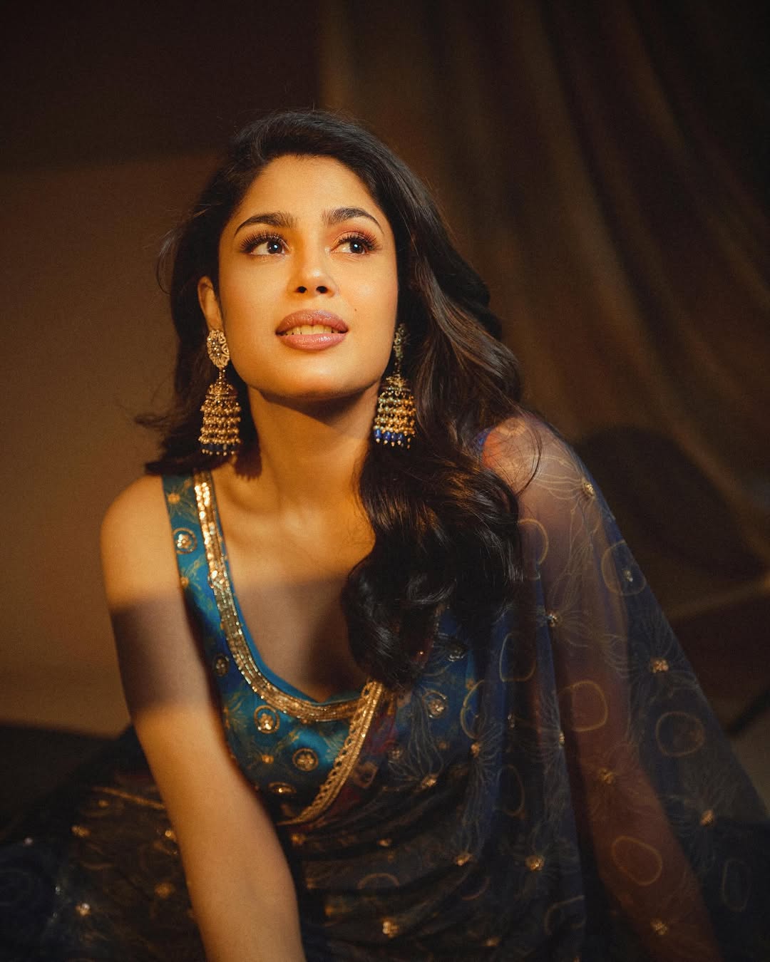 Faria Abdullah wearing statement earrings and Anarkali