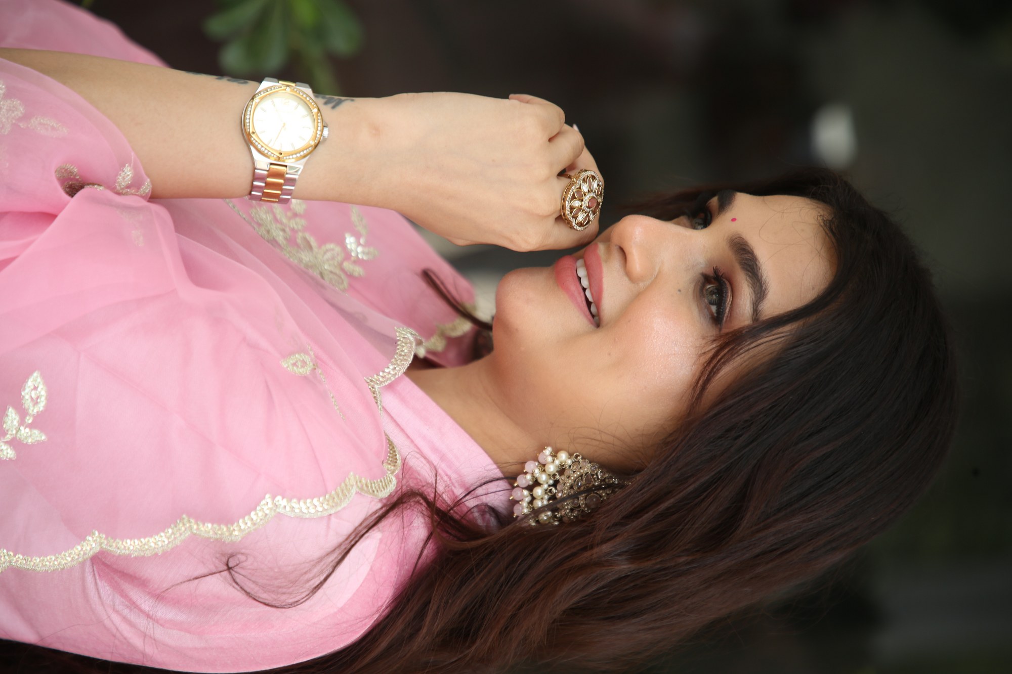 Hasini Sudhir traditional pink outfit with glamorous jewelry