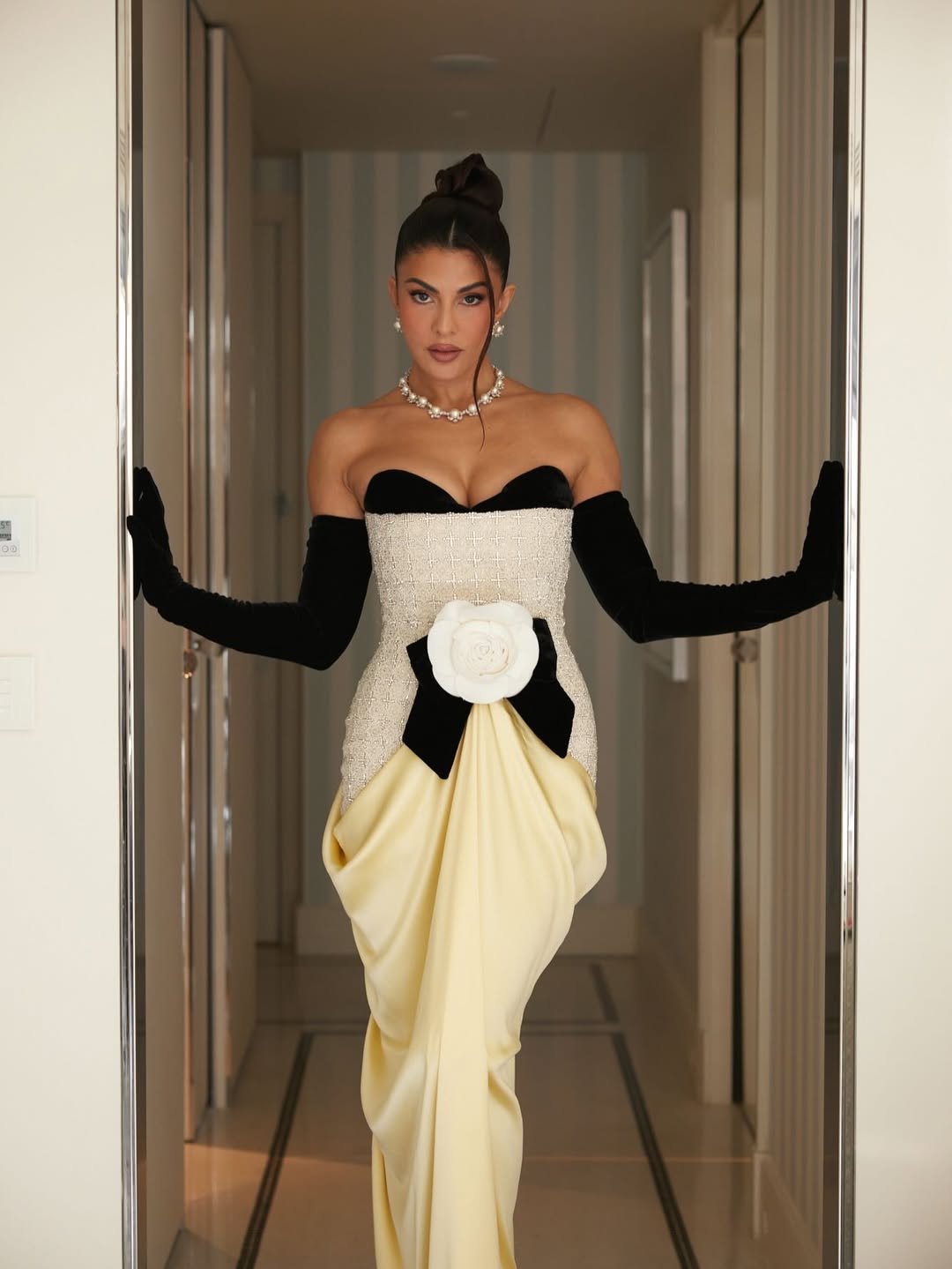 Regal Black Couture With Pearl Elegance