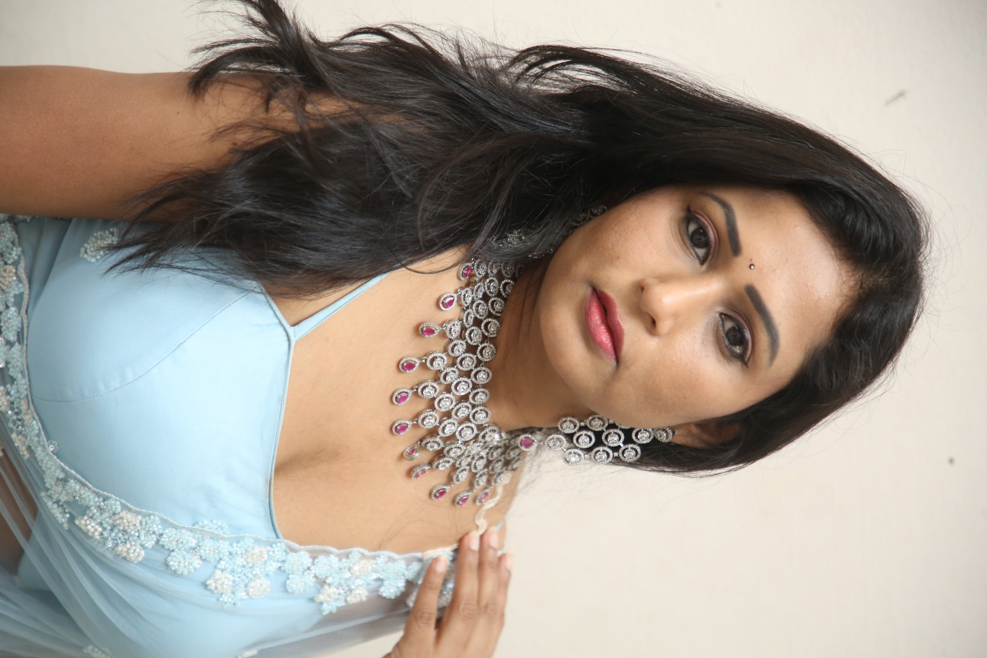 Jo Sharma elegant blue outfit sparkling jewelry look