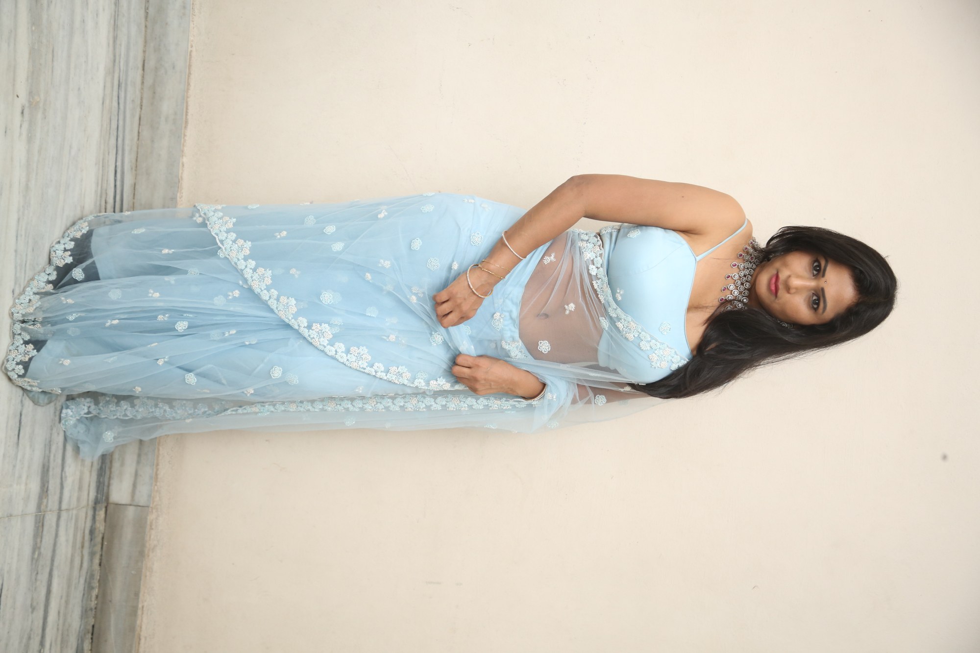 Jo Sharma stylish blue ensemble with bold jewelry