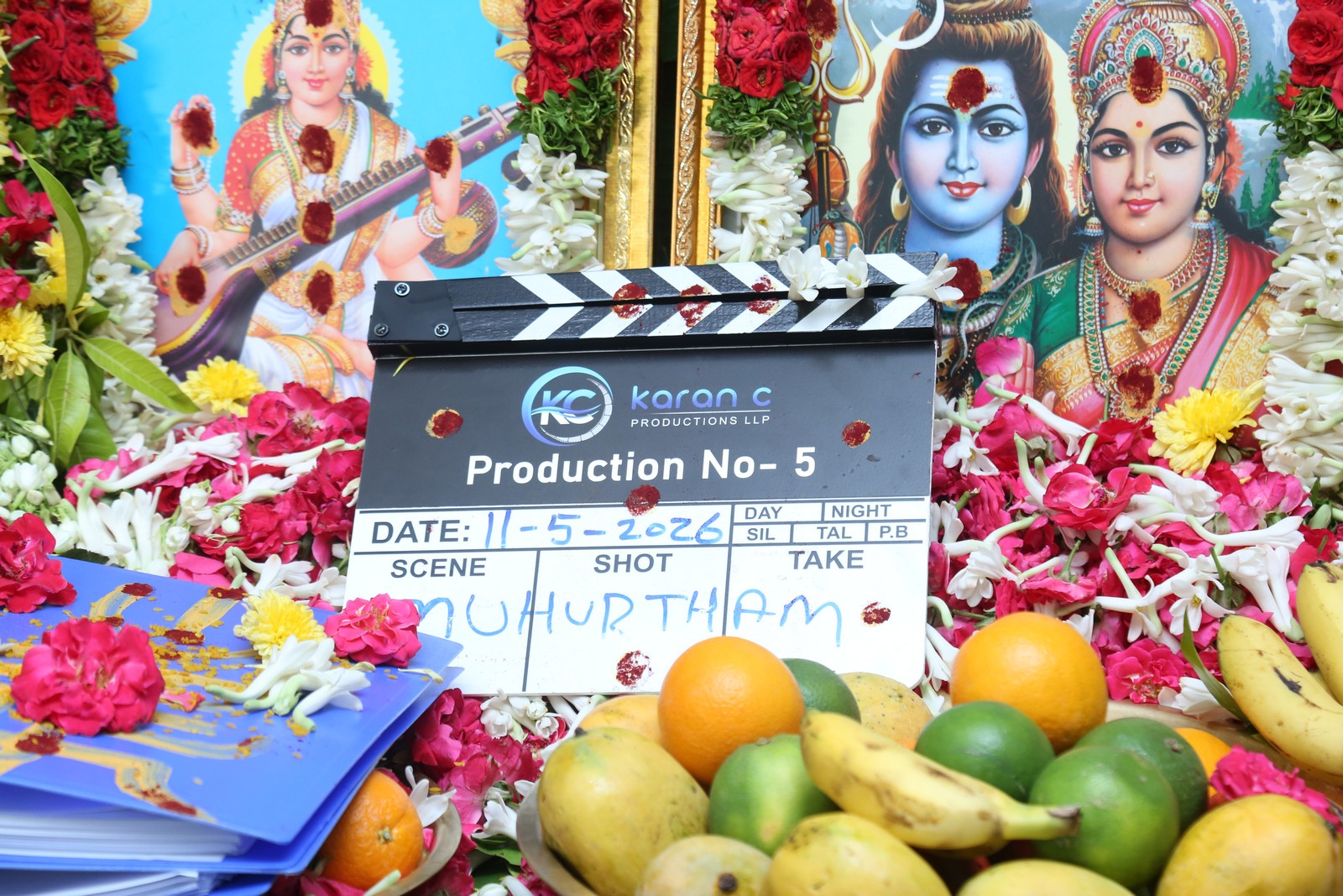 Clapboard placed before deity at film launch