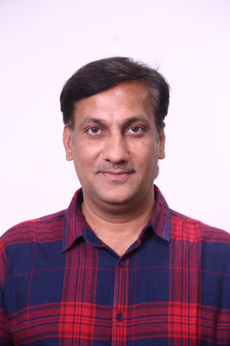 Karthikeya Kommi in classic plaid shirt look