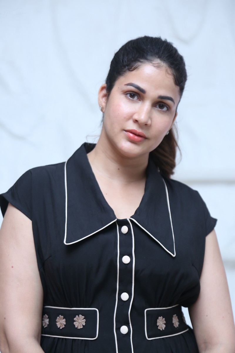 Lavanya Tripathi wearing a black dress with embroidered detailing