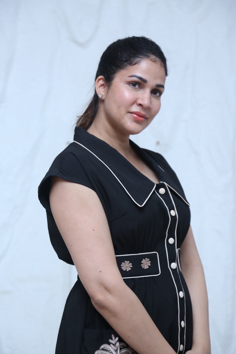 Lavanya Tripathi posing confidently in a sophisticated black outfit