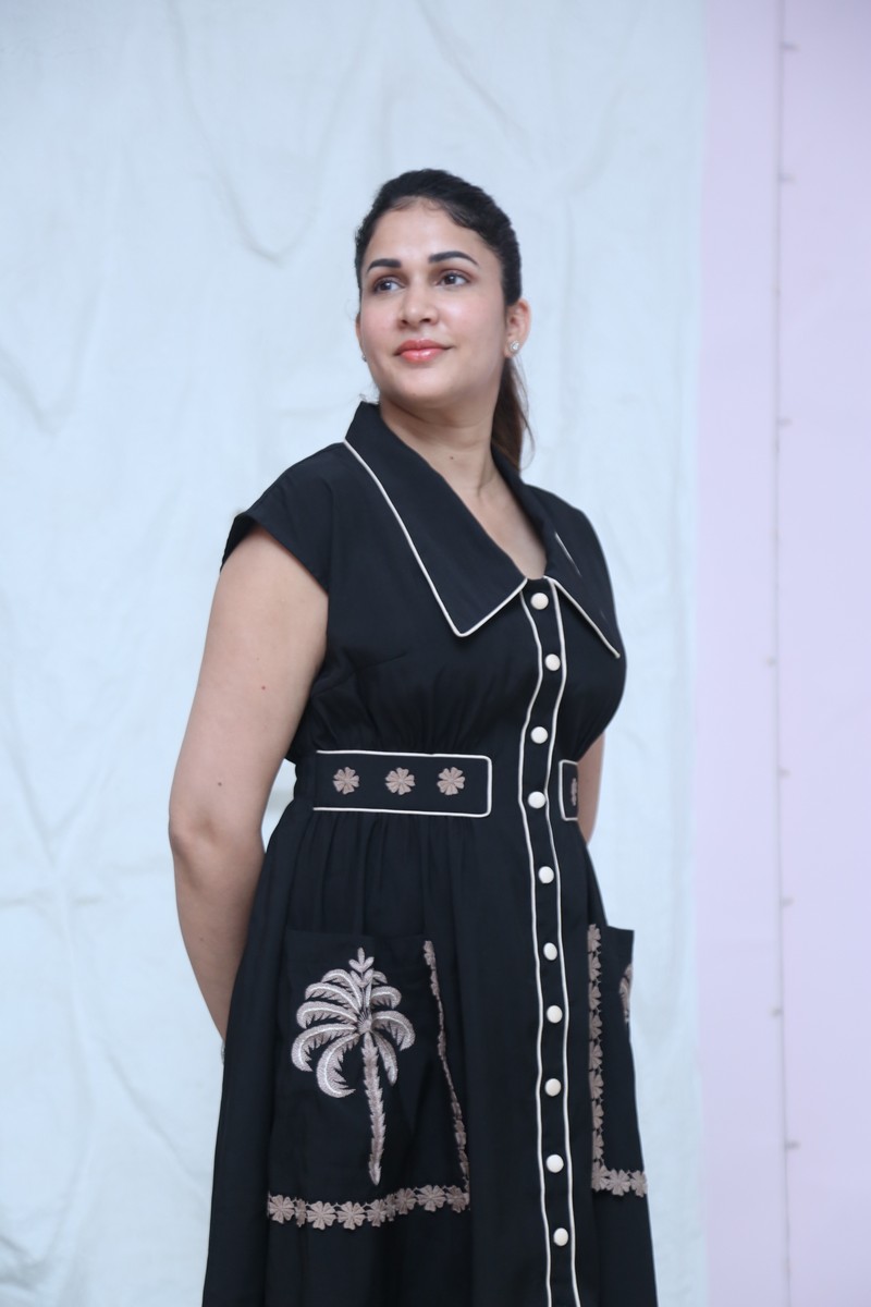 Lavanya Tripathi showcasing polished style in a chic black dress