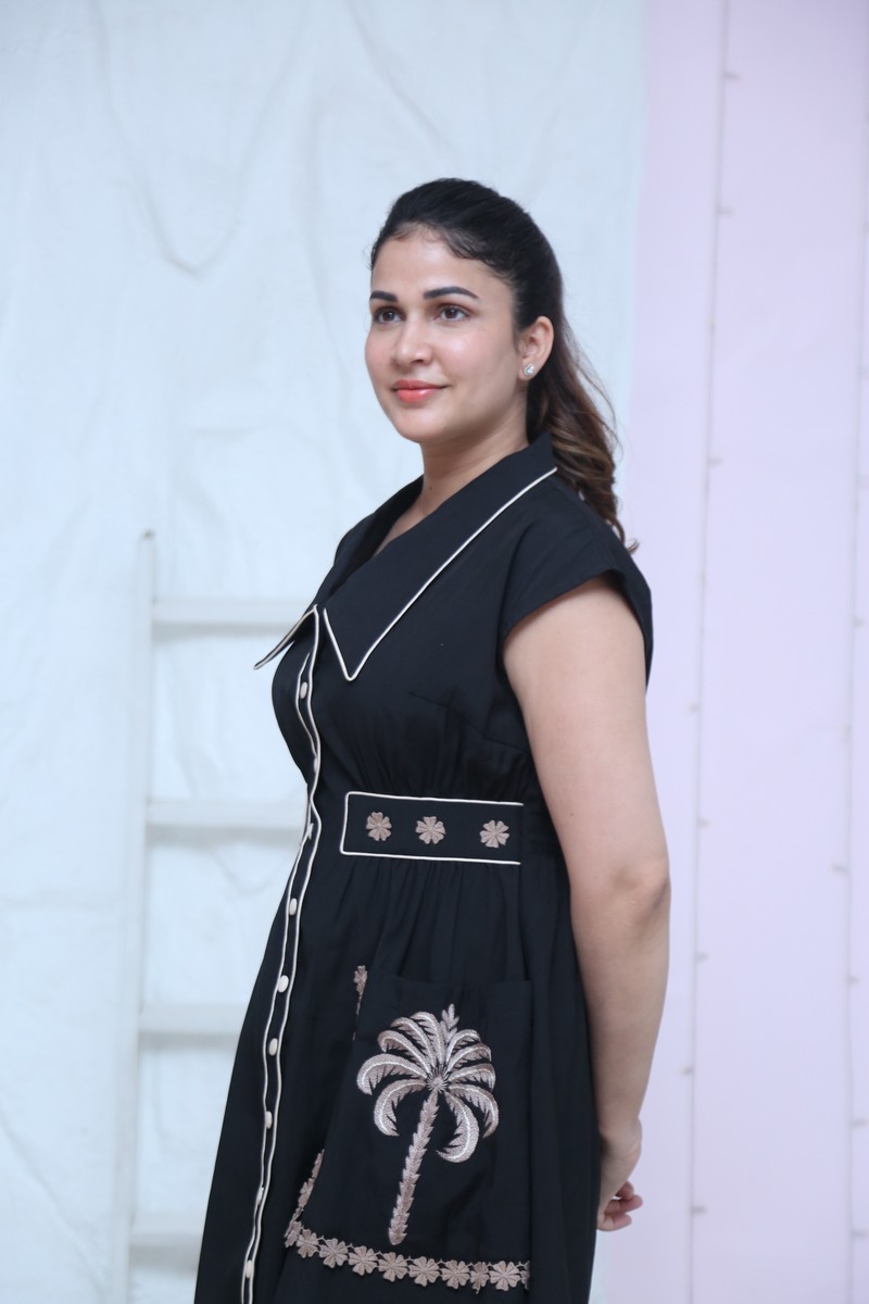 Lavanya Tripathi wearing black attire with tropical embroidered accents