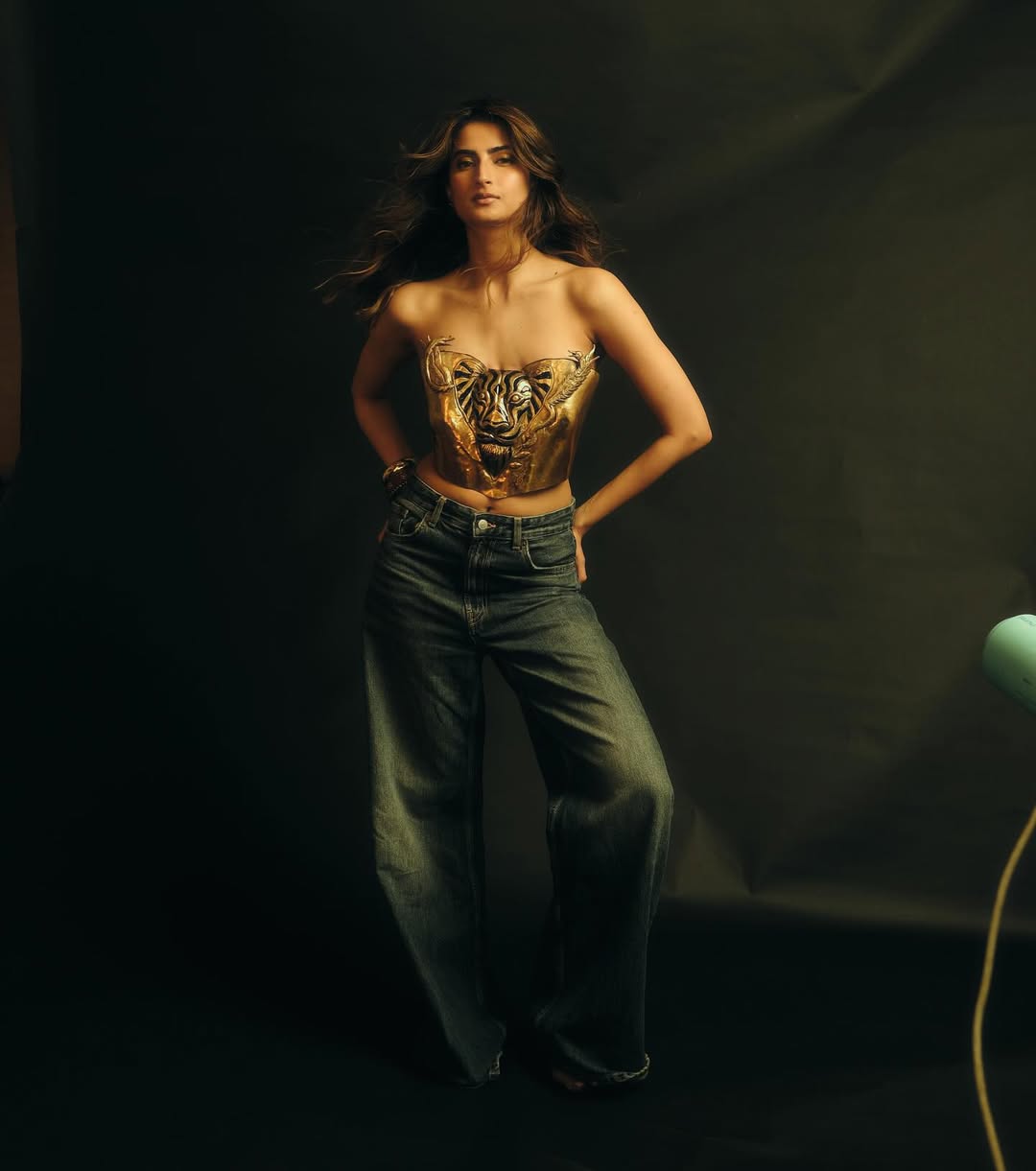The Metallic Gold Bustier Steals the Spotlight
