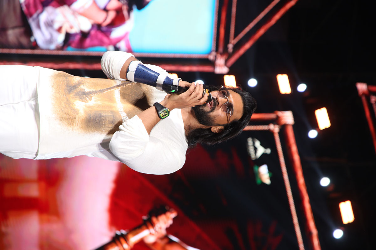 Ram Charan delivering a speech at the promotional event.