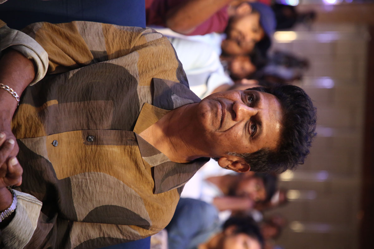 Shiva Rajkumar seated at Peddi press conference