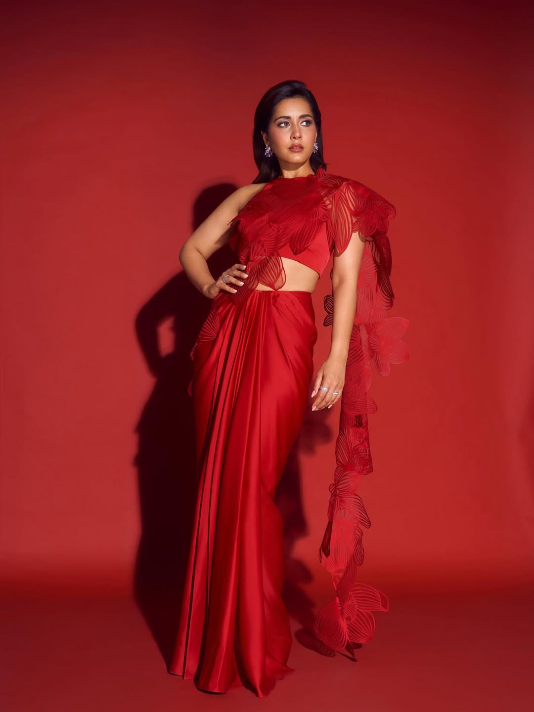 Raashii Khanna Owns The Red Carpet In Crimson Couture
