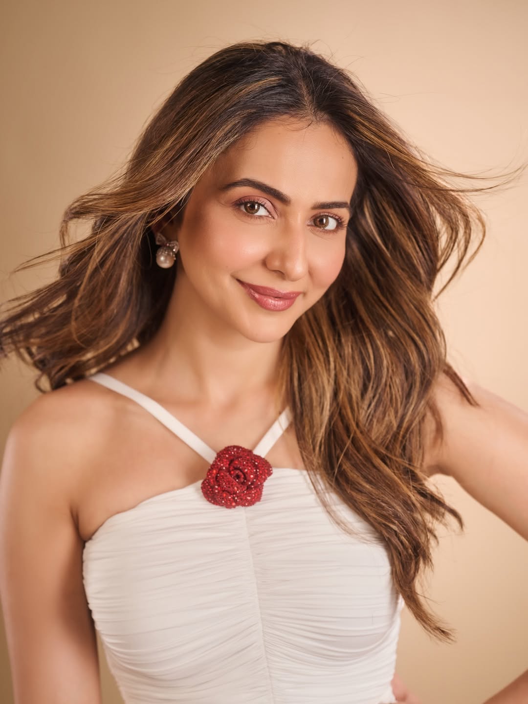 The Red Rose Detail Elevates the Entire Outfit